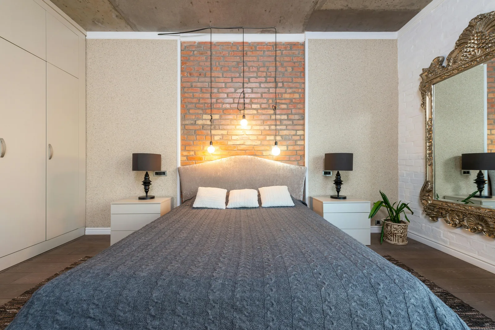 chambre cocooning avec textiles chaleureux et éclairage doux tête de lit